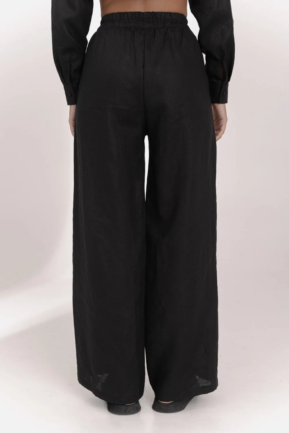 Black linen trousers with elastic waistband