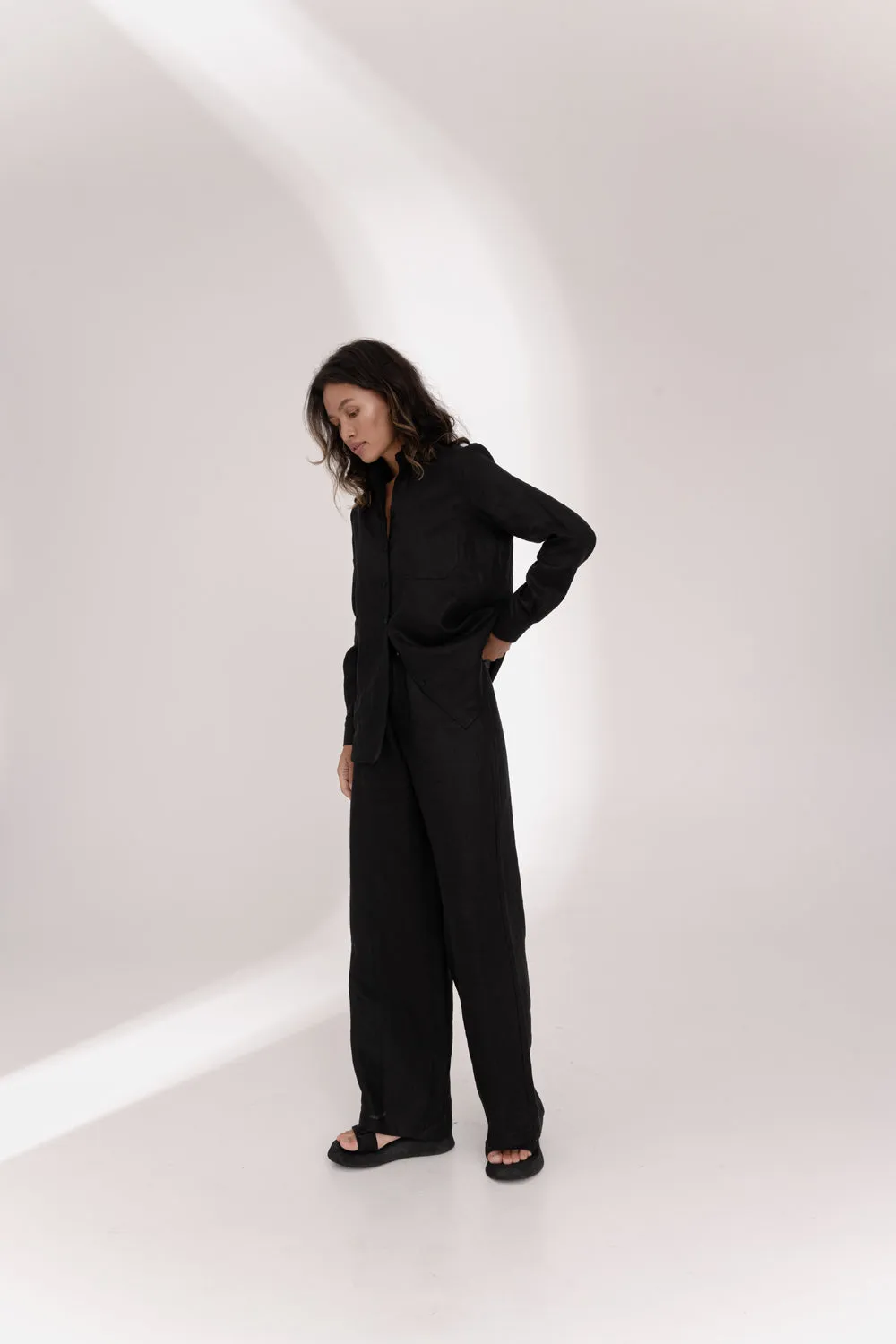 Black linen trousers with elastic waistband